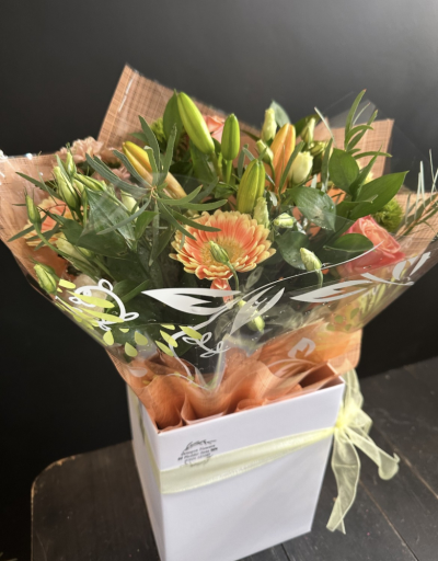 Peach and Cream - A handcrafted bouquet of fresh seasonal flowers in warm peach, apricot and cream tones, expertly arranged by Fiona at Octagon Flowers in Bolton.